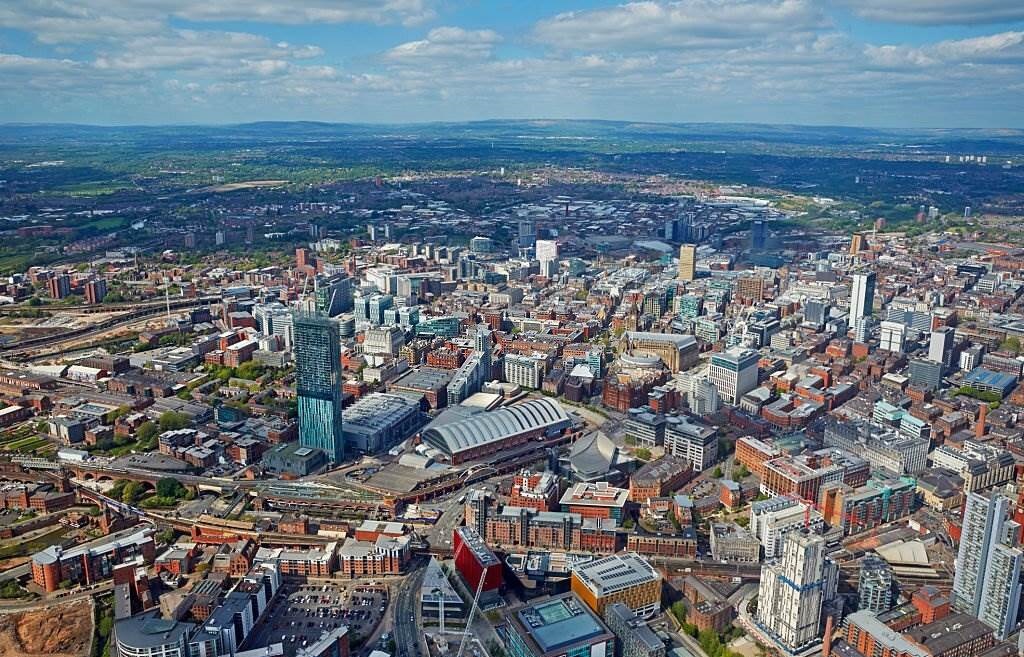 Aerial view of Manchester City Centre - Diverse Cities in England - Reasons to Visit England - Planet Travel Advisor Aerial view of Manchester City Centre - Diverse Cities in England - Reasons to Visit England - Planet Travel Advisor