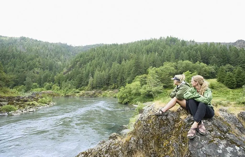 Two Young Women Hikers Enjoying the View of River in Rogue River in Medford Oregon - Attractions & Things to Do in Medford, Oregon - Planet Travel Advisor Two Young Women Hikers Enjoying the View of River in Rogue River in Medford Oregon - Attractions & Things to Do in Medford, Oregon - Planet Travel Advisor
