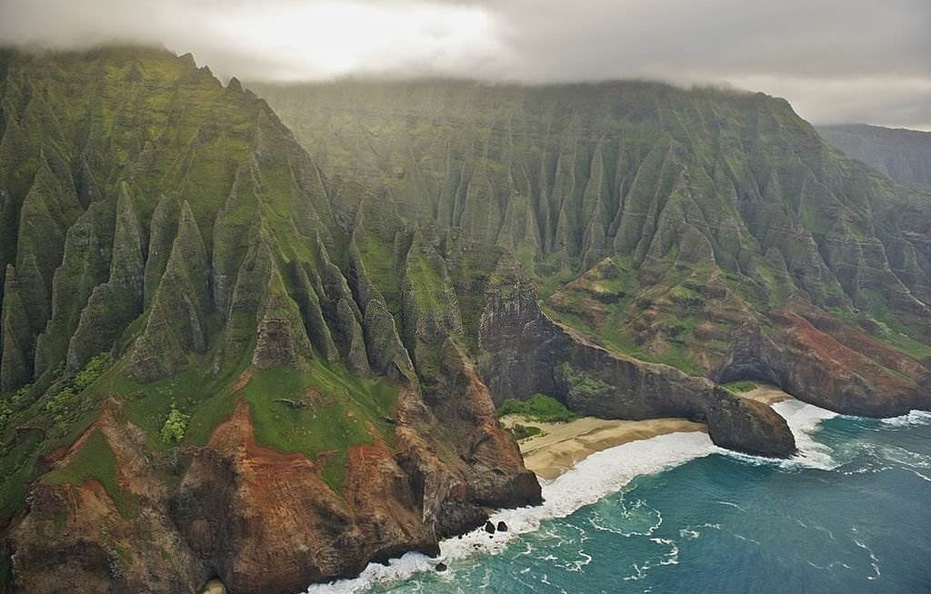 Visiting Hawaii During the Fall - Aerial view of Na Pali Coast, Kauai, Hawaii - Planet Travel Advisor