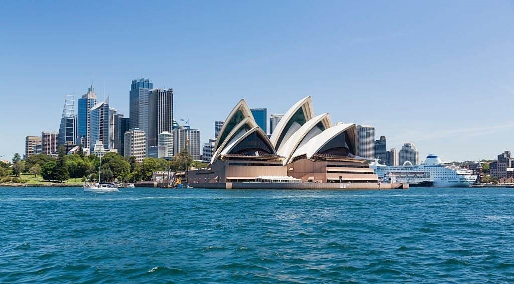 Sydney and the Opera House with P&O Pacific Pearl Cruise ship docked in the harbor, Australia - Best 5 Countries to Visit in 2023 With Tips - Planet Travel Advisor