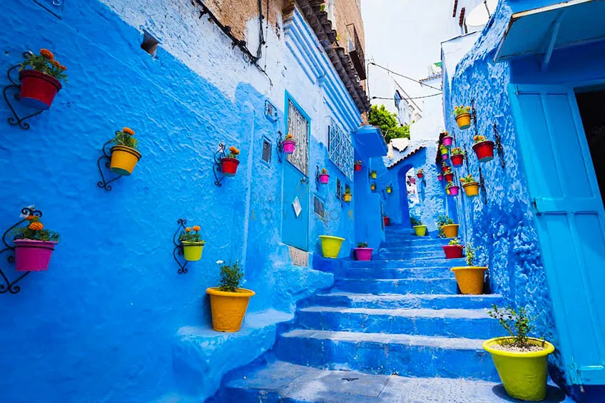 Alleyway in Chefchaouen, Morocco - Best Time to Visit Morocco - Planet Travel Advisor