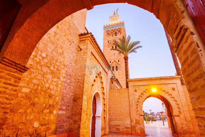 Low-angle view of Koutoubia Mosque in Marrakesh, Morocco - Best Time to Visit Morocco - Planet Travel Advisor
