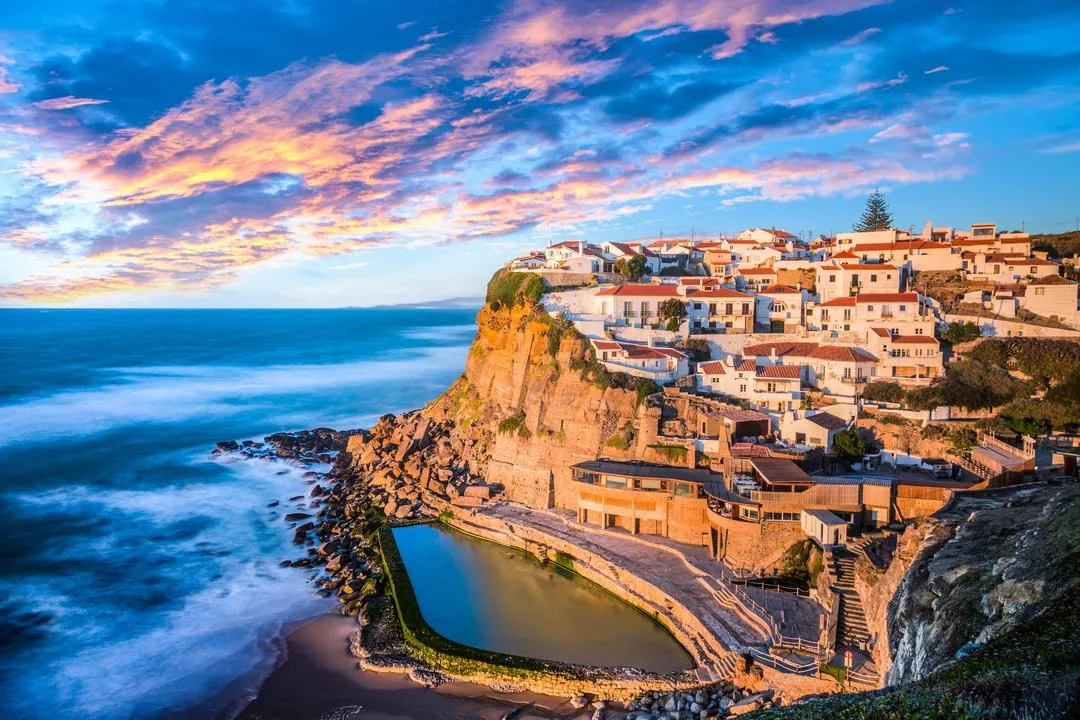 Azenha do Mar beach - Where to Travel in July - Planet Travel Advisor