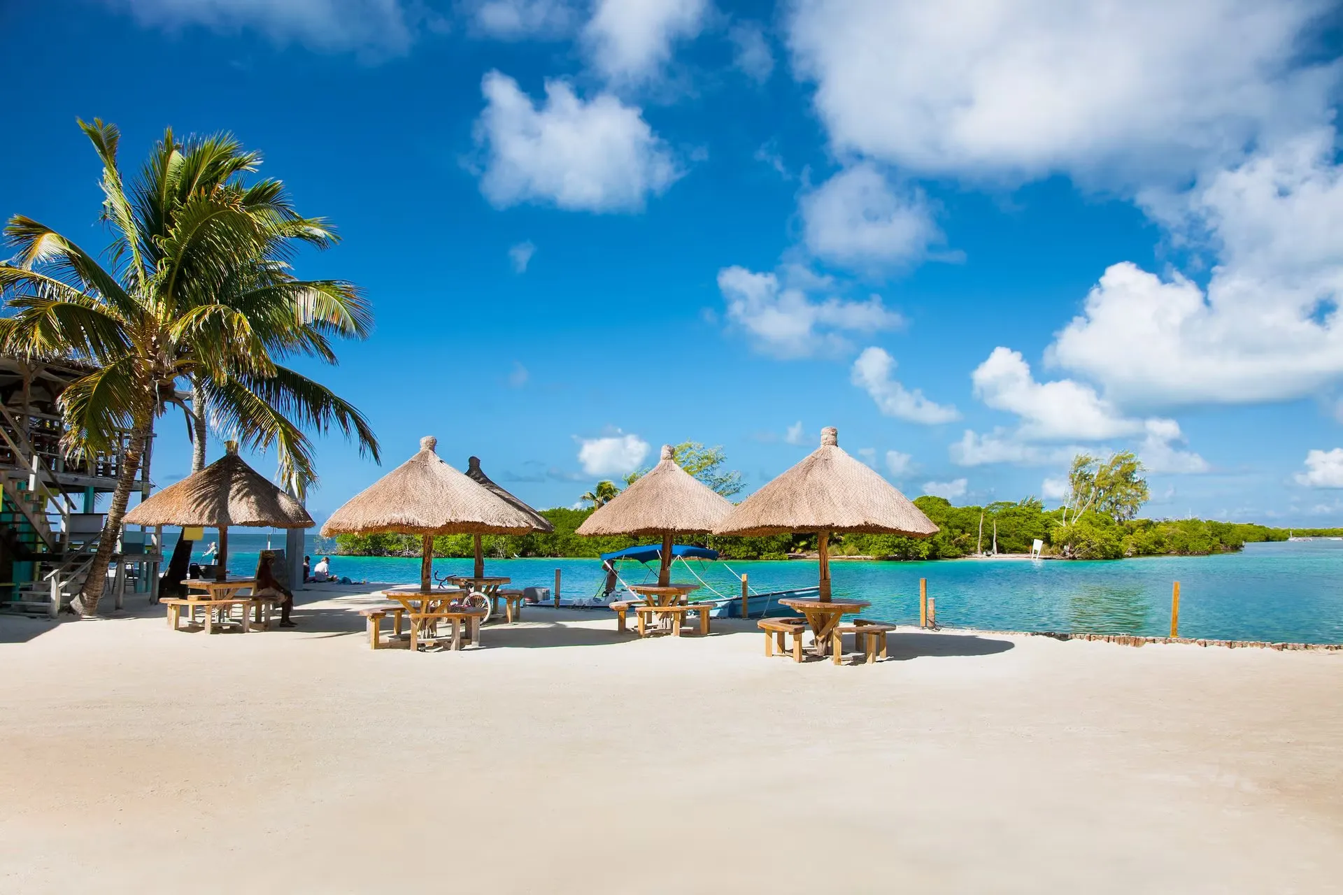 Belizean Beach - Where to Travel in June - Planet Travel Advisor