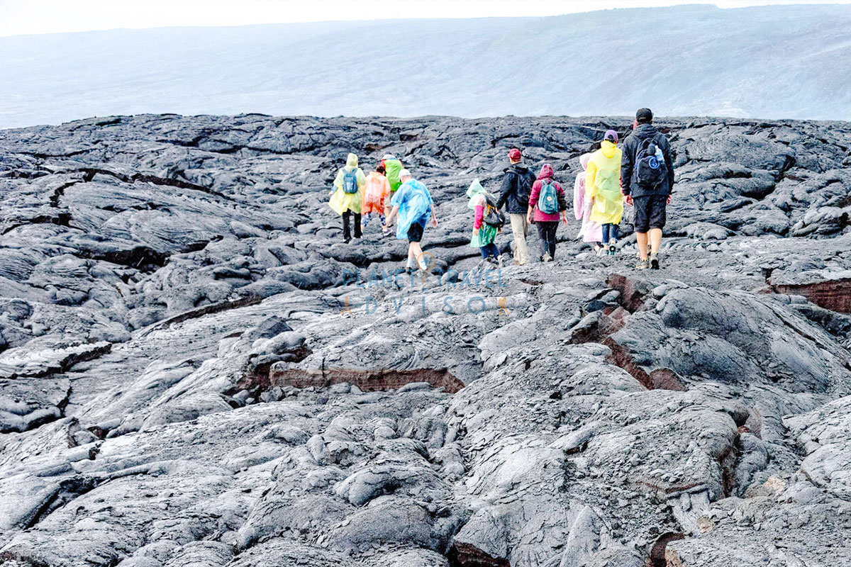 Tourists Hiking Out to See the Lava Flow, Kalapana Island - Worst Time to Visit Hawaii - Planet Travel Advisor Tourists Hiking Out to See the Lava Flow, Kalapana Island - Worst Time to Visit Hawaii - Planet Travel Advisor