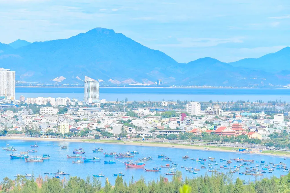 Aerial View of Fishing Boats Near My Khe Beach and Da Nang City - Planet Travel Advisor