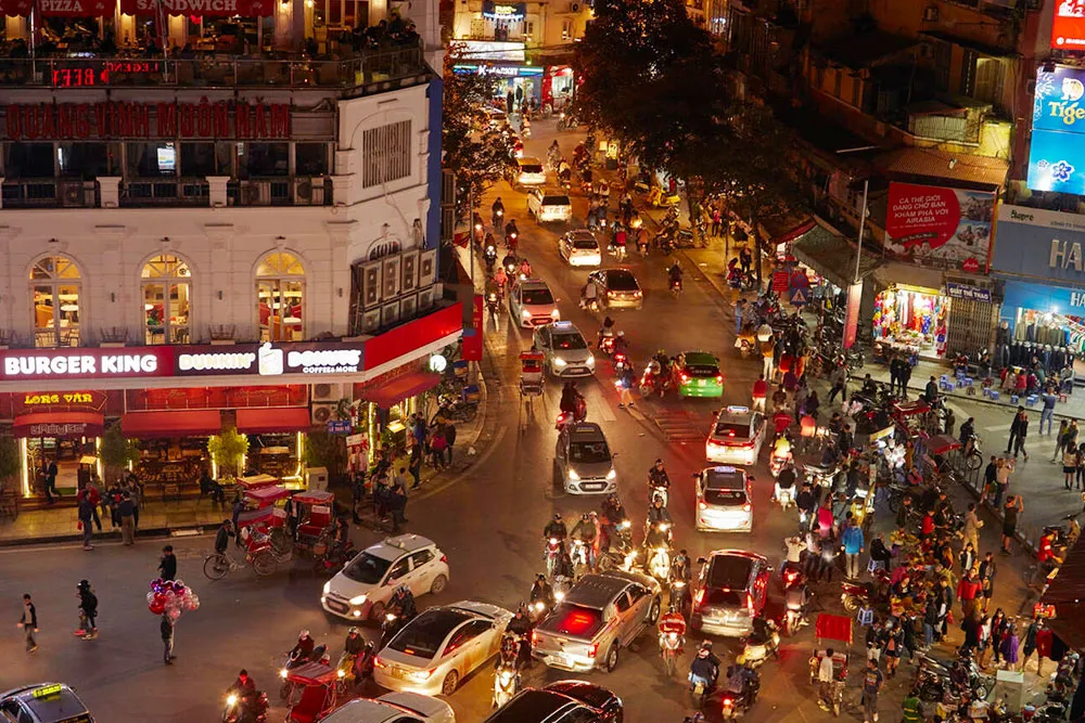 Bustling Night Traffic at the Busy Intersection Near Hoan Kiem Lake - Planet Travel Advisor