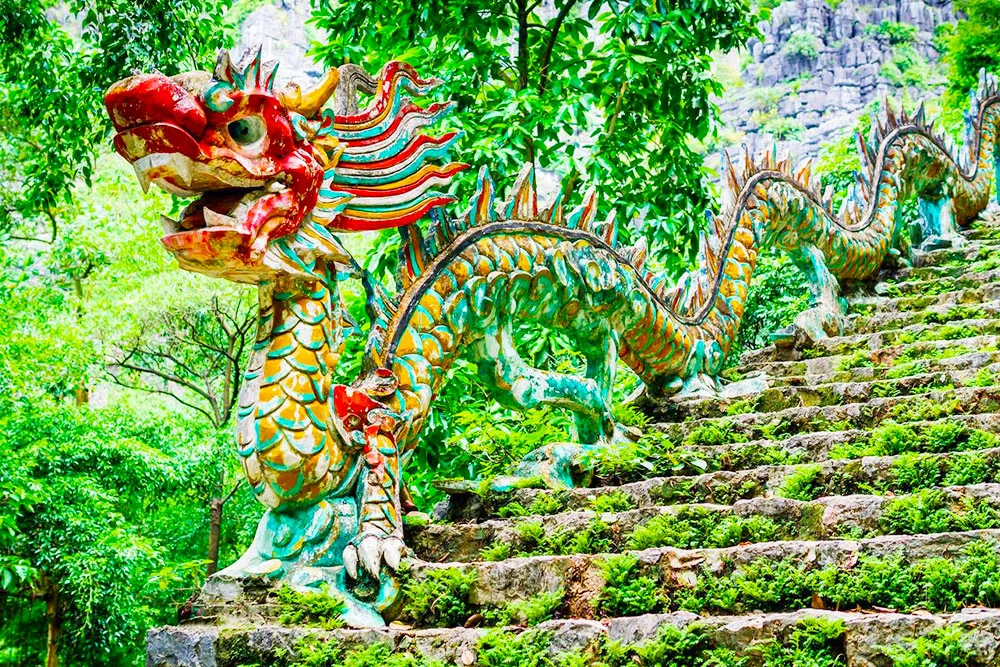 Dragon Stone Along the Staircase to Hang Mua Pagoda and Mua Cave - Planet Travel Advisor