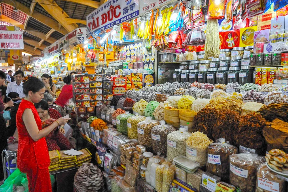 A Bustling Market in Ben Thanh Market - Planet Travel Advisor