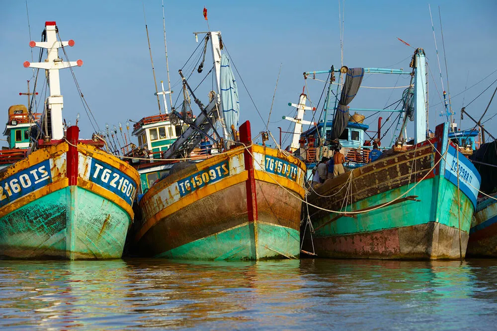 Boats on the River at My Tho, Mekong River Delta - Planet Travel Advisor