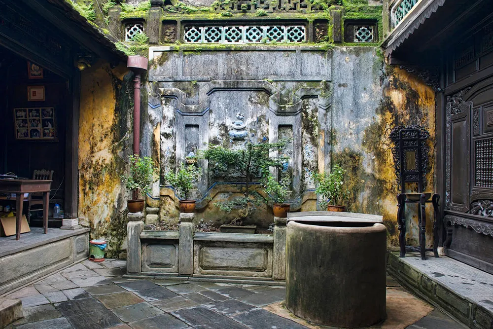 Courtyard and Well in the Old House of Tan Ky - Planet Travel Advisor